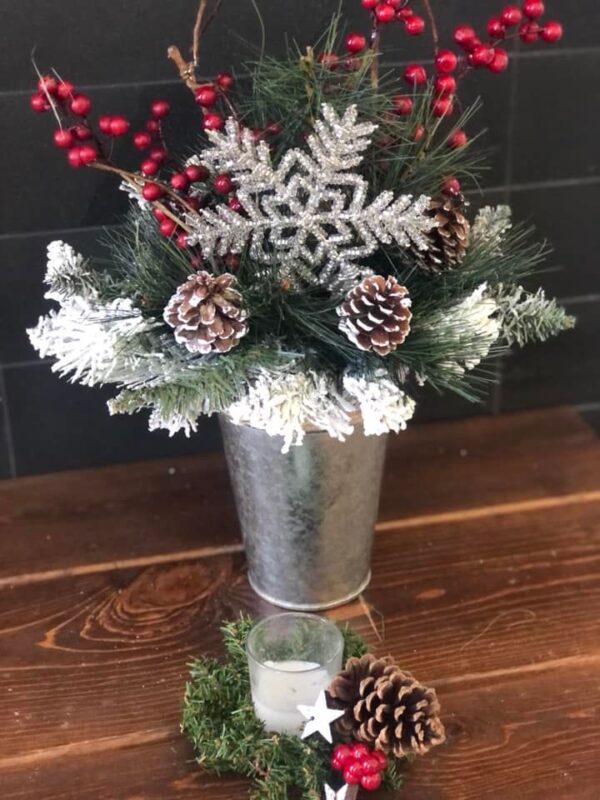 A table with some decorations in a vase